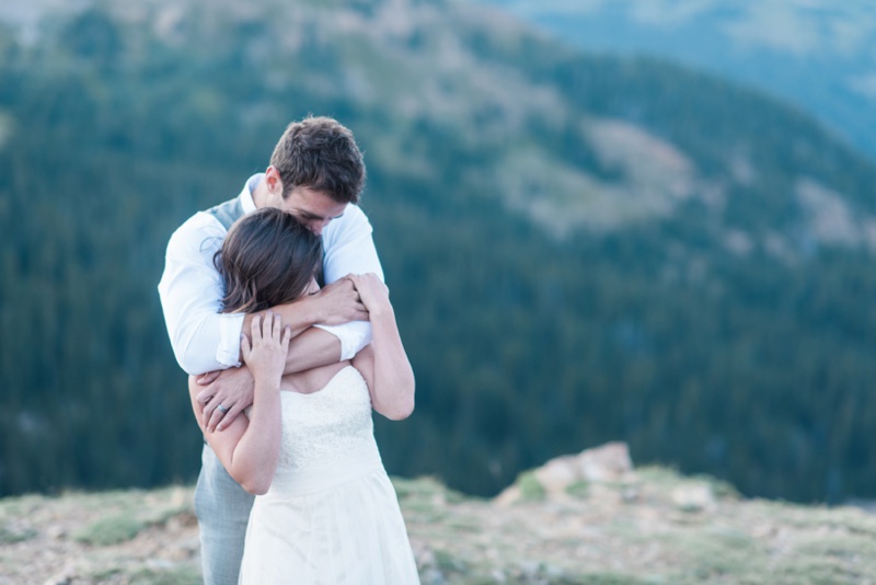 warm mountain top cuddles Colorado elopement 