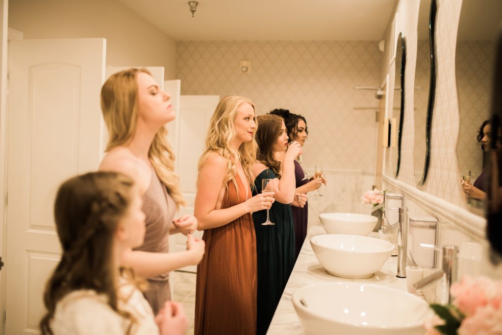 Bridesmaids getting ready at Wedgewood Weddings Black Forest Colorado