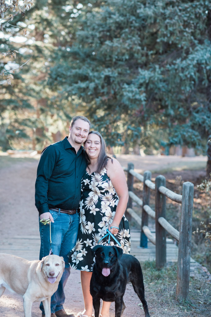 beautiful autumn pictures with fiancé in Colorado with pine trees