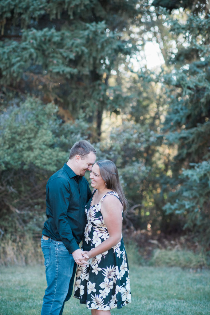 slow dancing during engagement portraits in Colorado Springs, Colorado with Jenna Wren