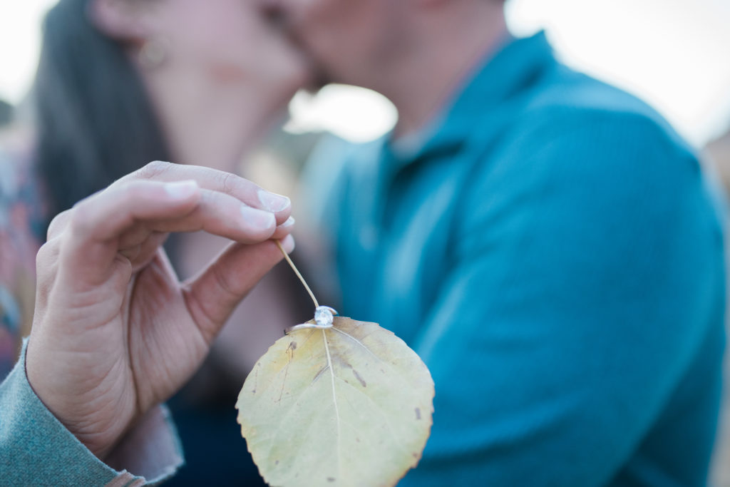 fall leaf engagement portrait ideas in Colorado with Jenna Wren aspen leaf