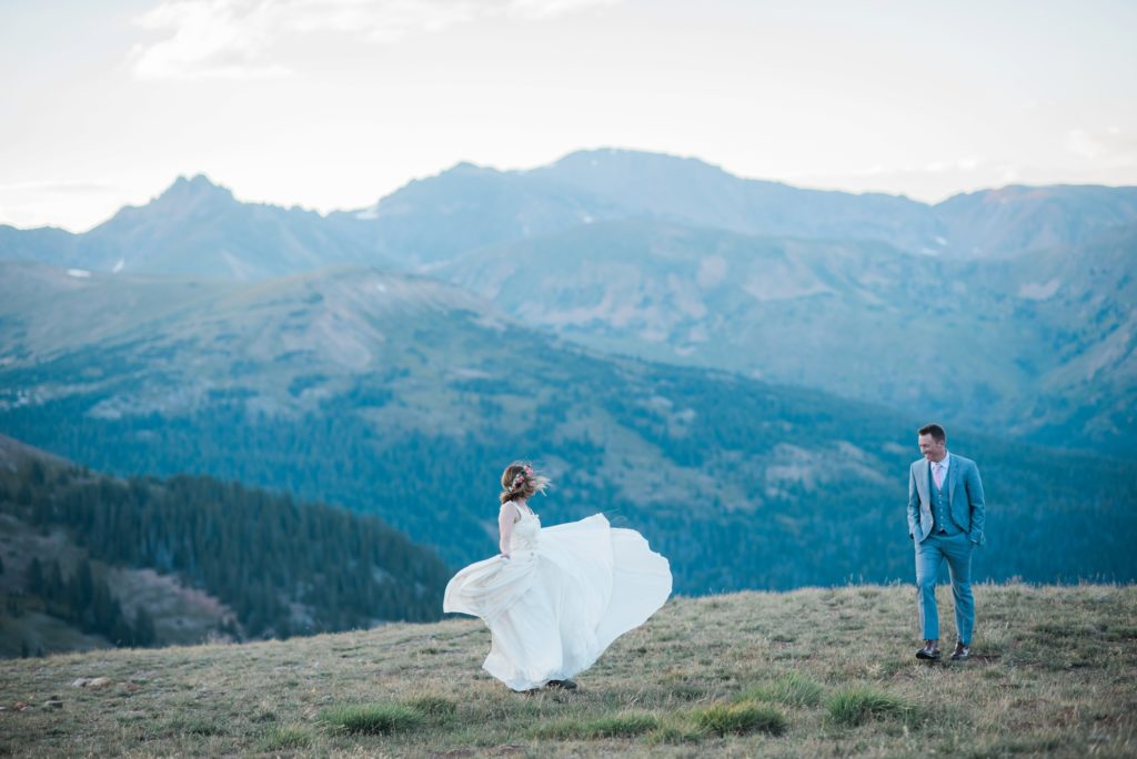 Dancing on top of a mountain for elopement 