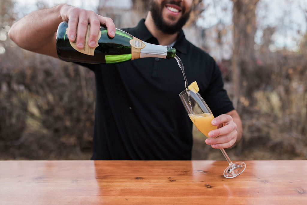 Champagne pour with Wandering Wagon Bars