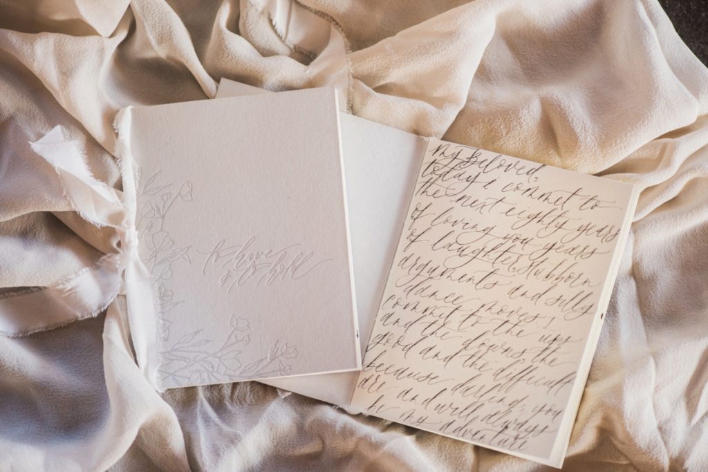 Vow Books on stunning peach linen by Tono & Co