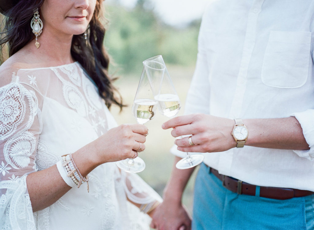 Champagne toast on a private estate during wedding celebration for couple 