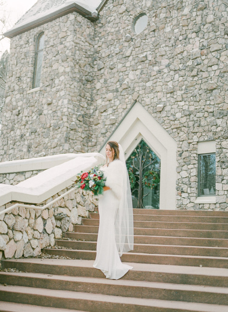 Stunning bride on the steps of the Chapel at Beaver Creek in the Beaver Creek resort 