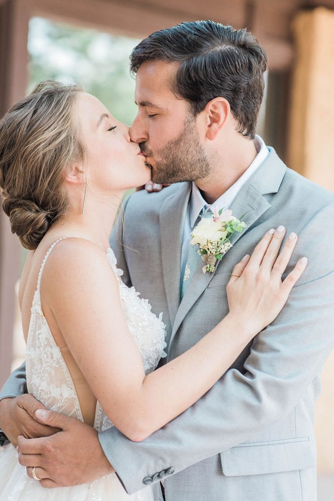 couple kiss at Villa Parker Denver Wedding Venues 