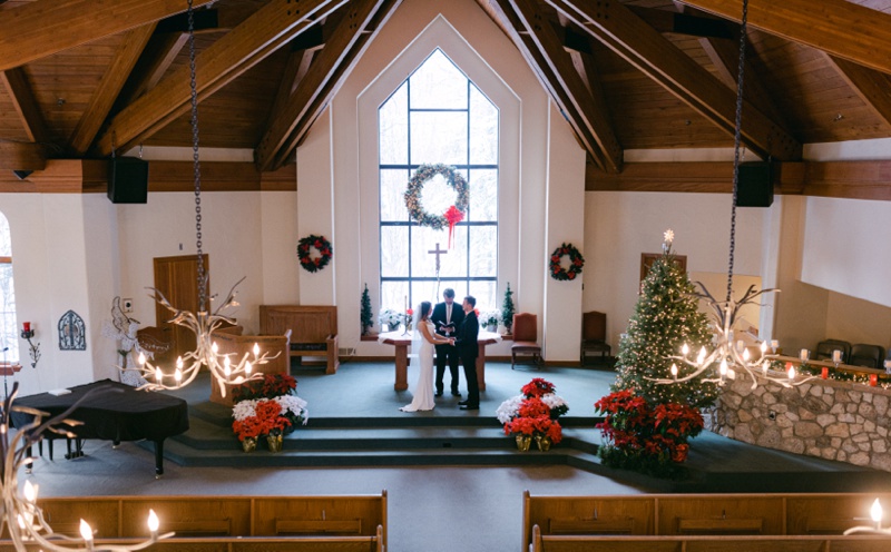 inside the chapel at beaver creek during wedding ceremony