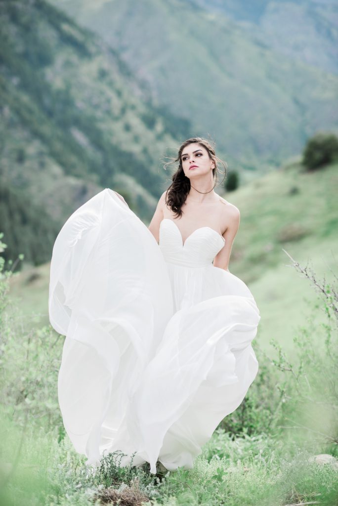 Denver wedding photographer captures bride with wind swept gown 