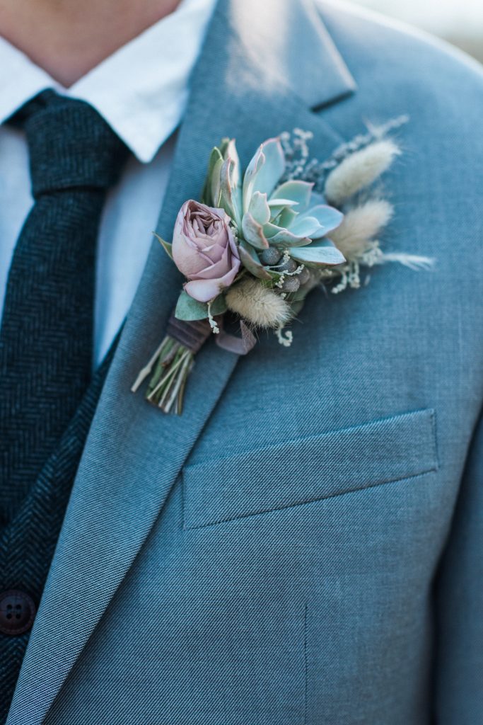 vail wedding photographers with boutonniere by LaRue Floral