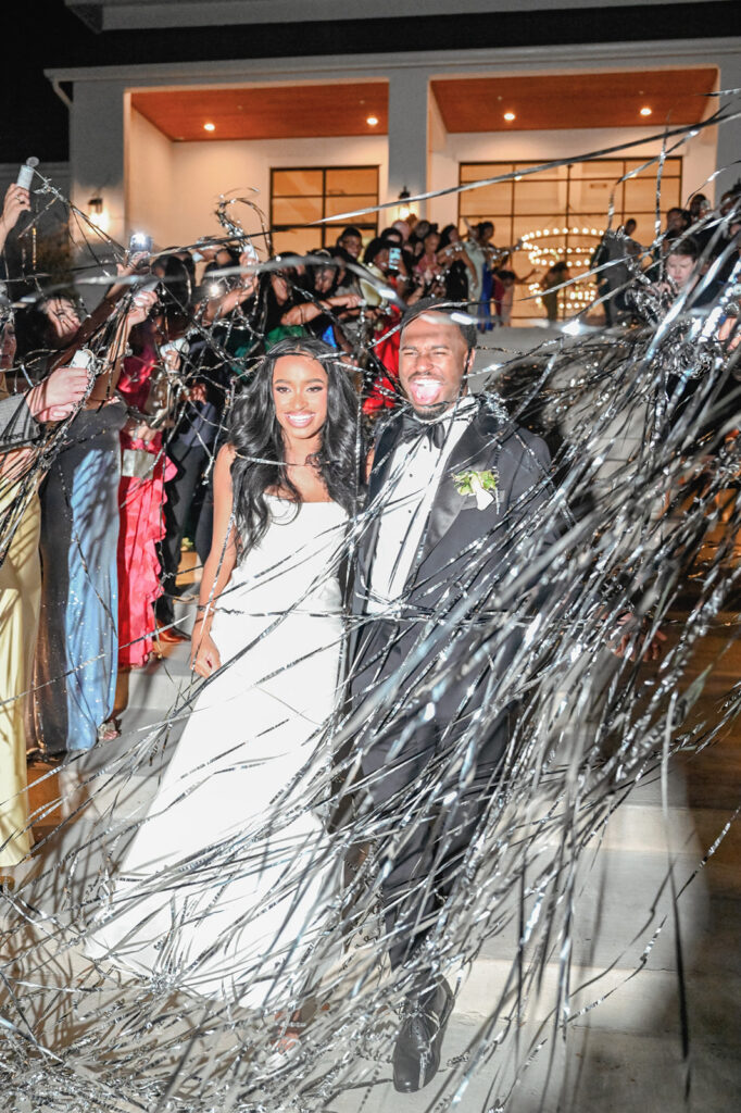 Modern meets timeless wedding at The Arlo in Austin, featuring a black-tie outdoor ceremony, elegant editorial florals, and stylish indoor reception with natural light.