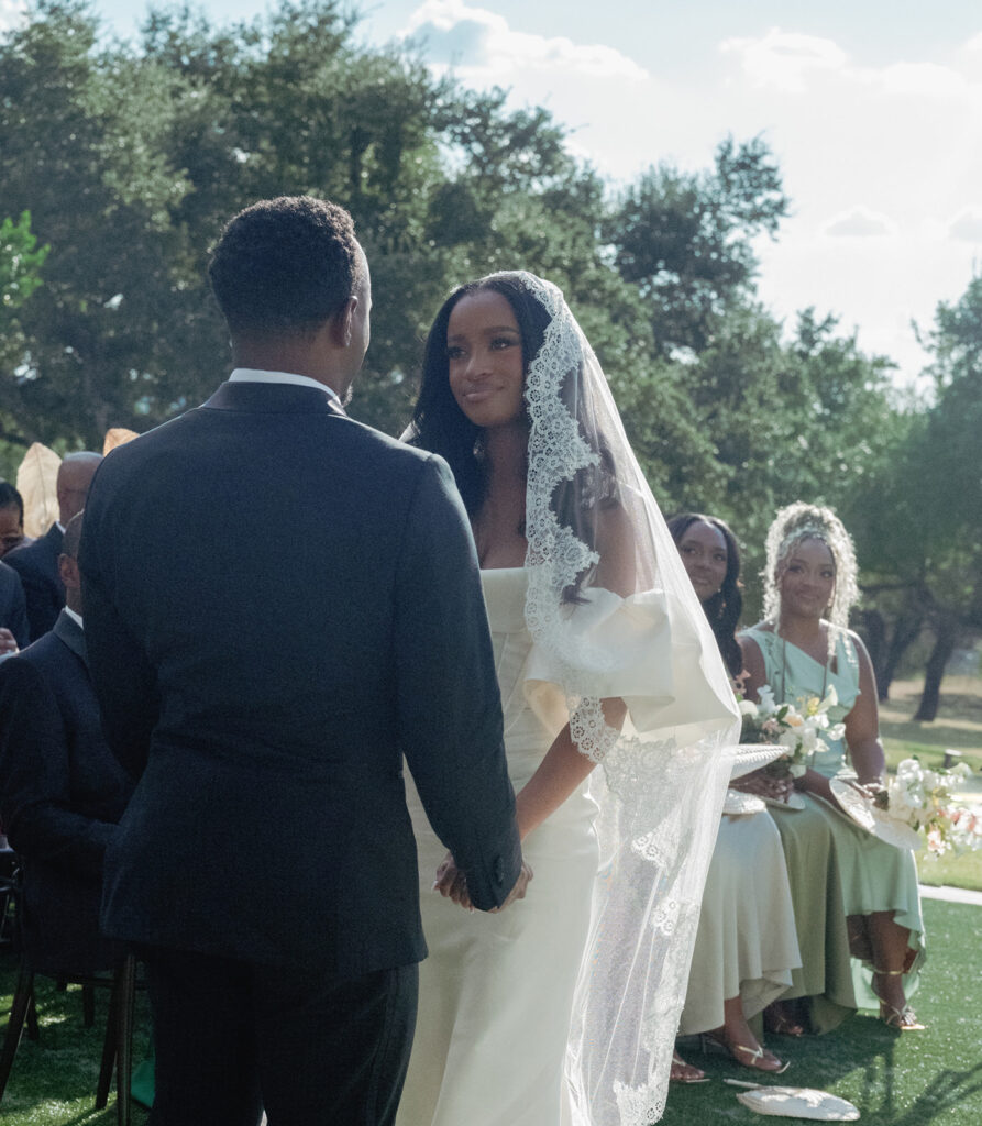 Editorial wedding portraits of bride and groom at The Arlo, framed by clean architecture and soft Texas hill country light.”