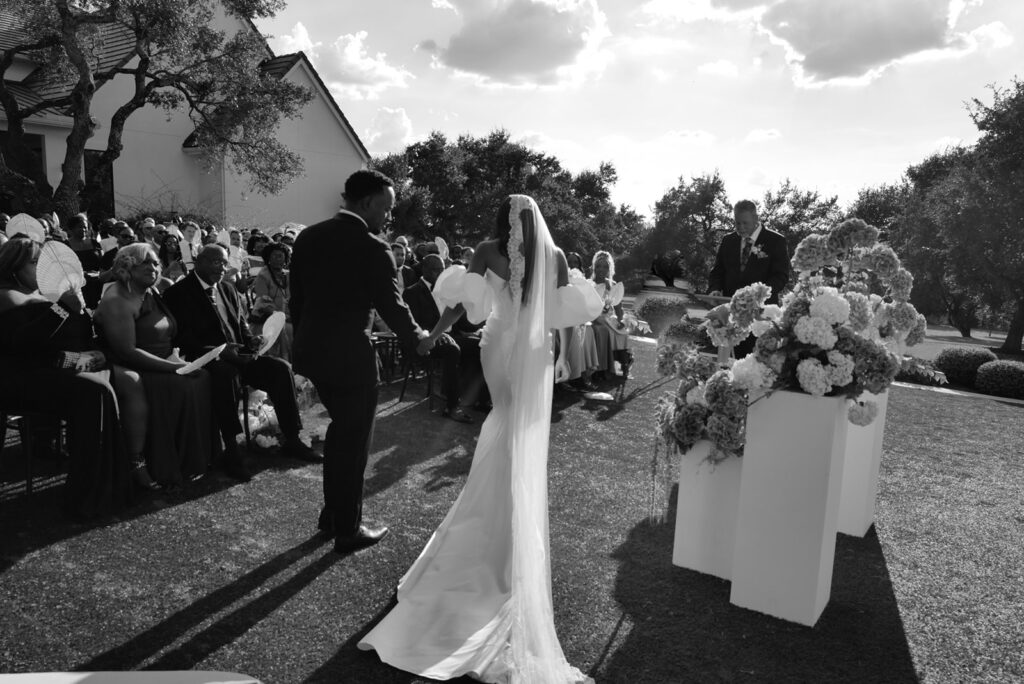 Editorial wedding portraits of bride and groom at The Arlo, framed by clean architecture and soft Texas hill country light.”