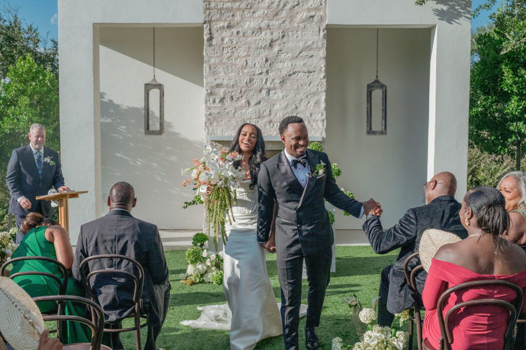 Editorial wedding portraits of bride and groom at The Arlo, framed by clean architecture and soft Texas hill country light.”