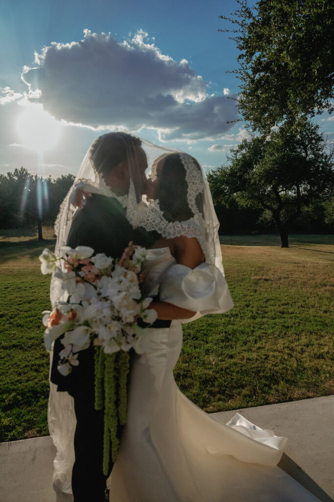 Editorial wedding portraits of bride and groom at The Arlo, framed by clean architecture and soft Texas hill country light.”