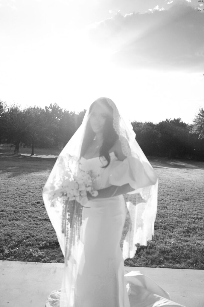 Editorial wedding portraits of bride and groom at The Arlo, framed by clean architecture and soft Texas hill country light.”